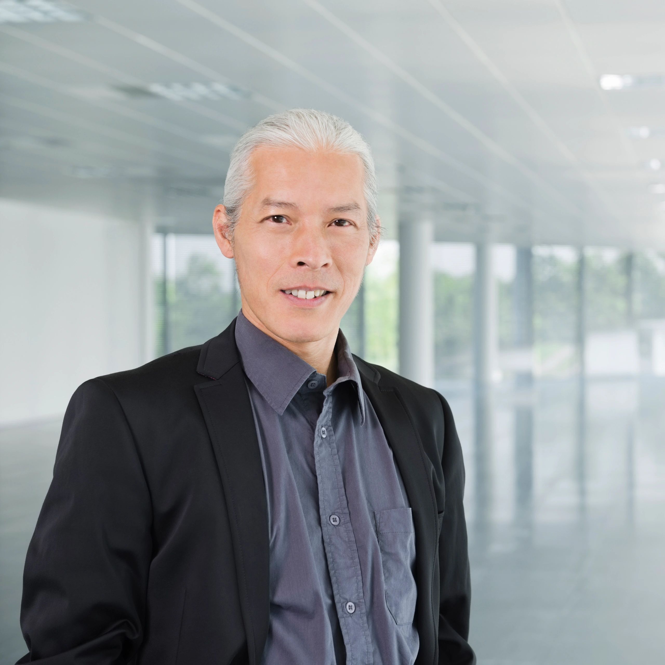 Professional headshot of a business leader