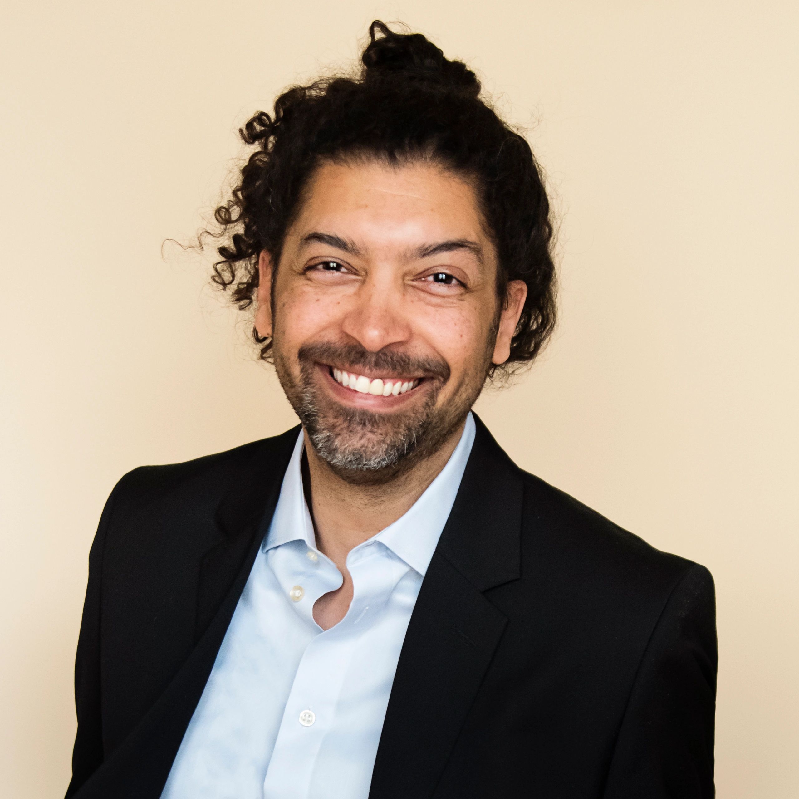 Professional headshot for testimonial author