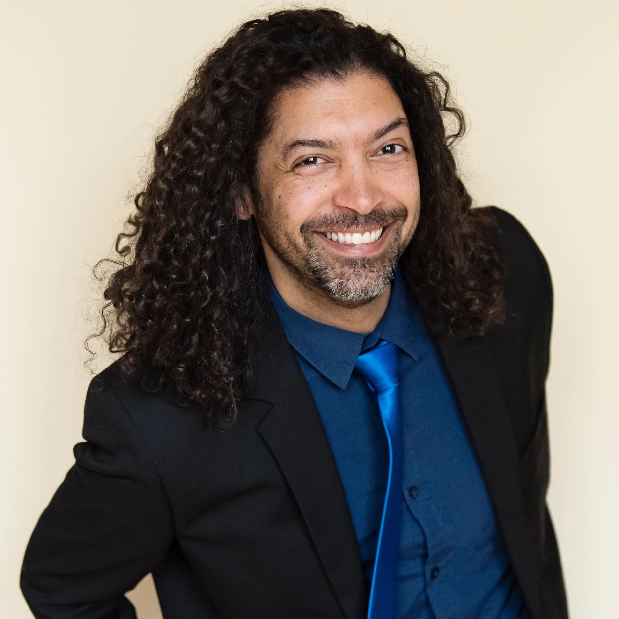 Professional headshot for testimonial author
